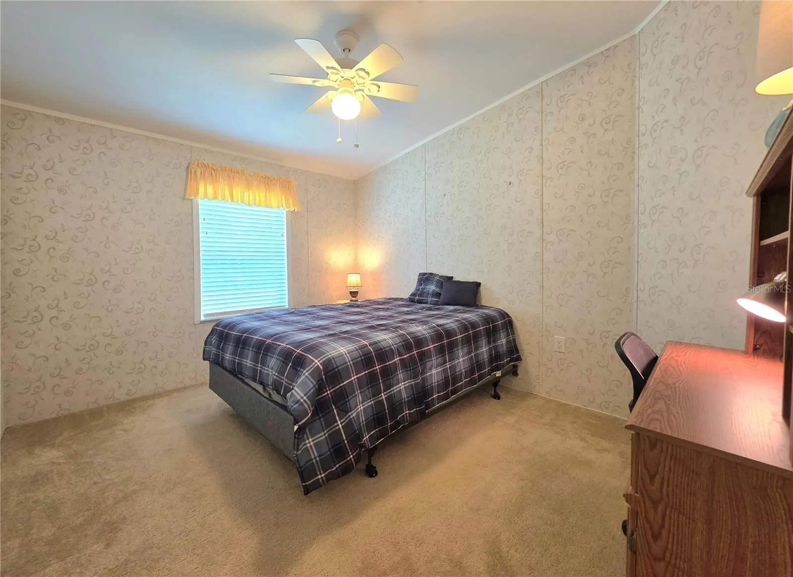 Guest bedroom with walk-in closet.