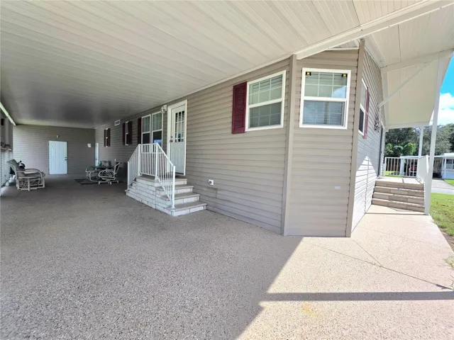 Decoratively finished driveway &amp; covered front walkway.