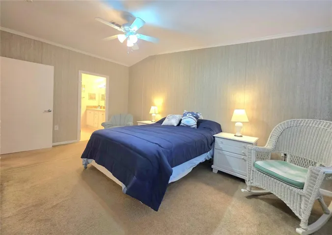 Primary bedroom with walk-in closet and en-suite bathroom.