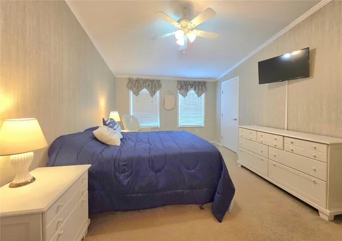 Primary bedroom with walk-in closet and en-suite bathroom.
