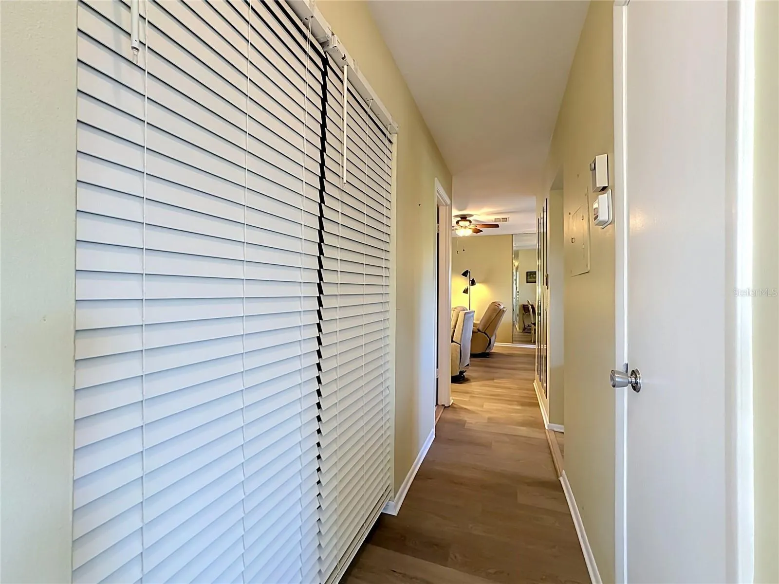 Newer HVAC and Water Heater Behind Blinds