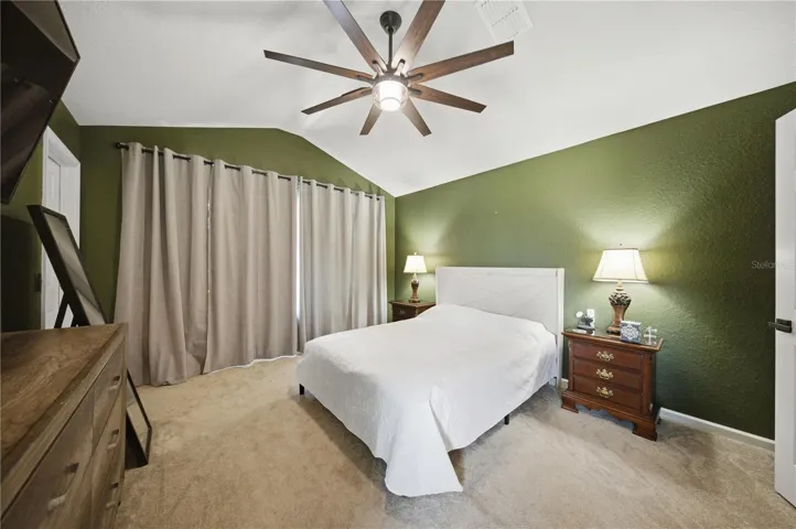 Primary bed, vaulted ceiling, remote big fan
