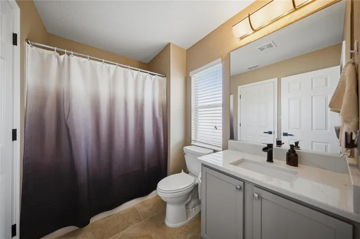 2nd bath joins to one bedroom and hallway