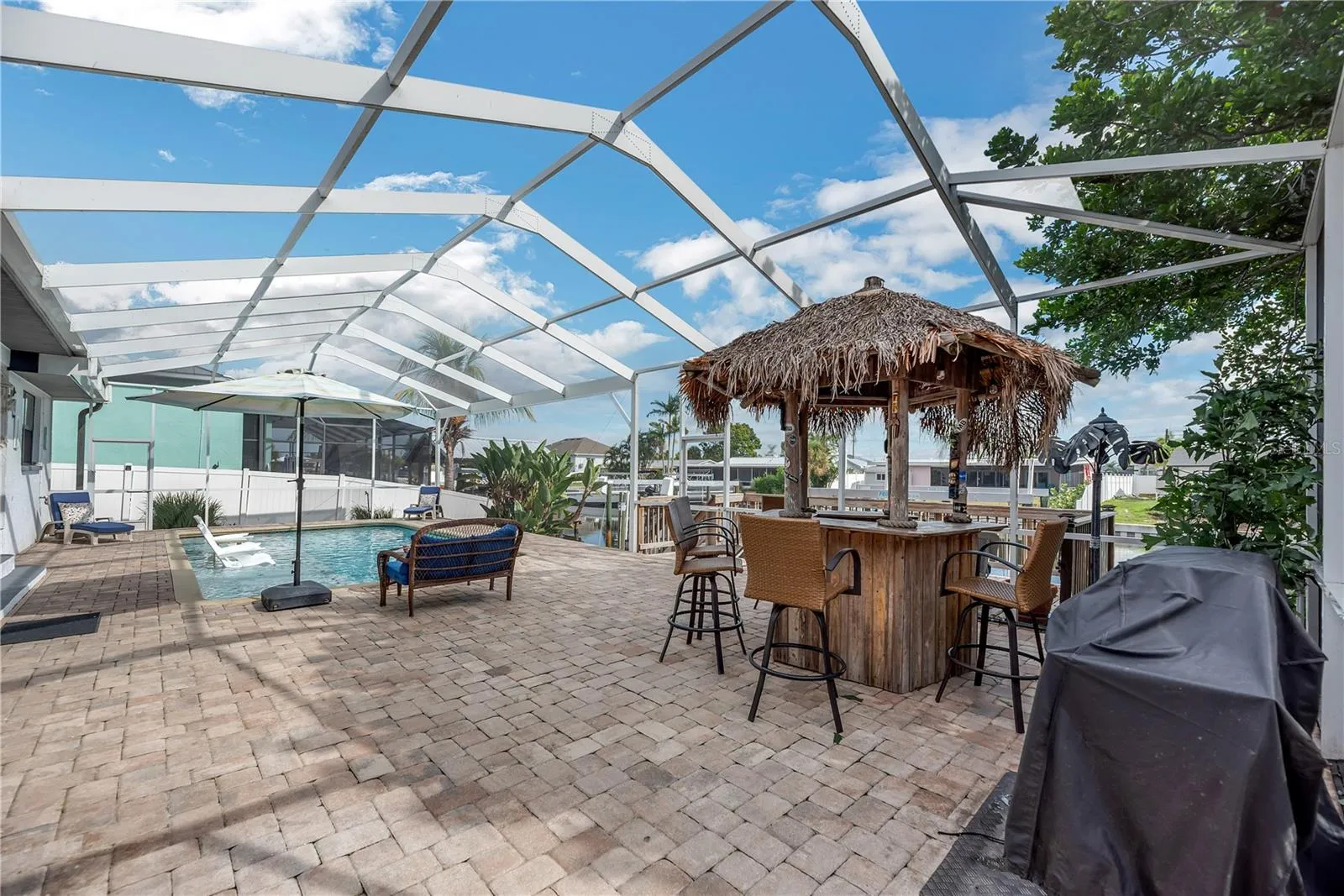 Family and guests will gather around this Tike bar while you grill.