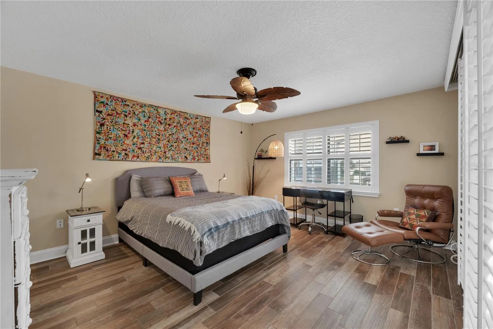 The split-bedroom floor plan offers privacy and flexibility with this secondary bedroom located on the opposite side on the home from the Primary Suite.