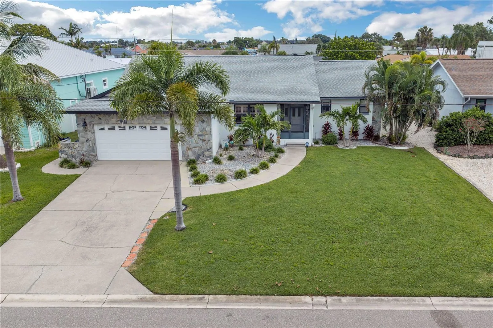 Significant Improvements &amp; Updates upgraded roof, updated hot water tank, and numerous improvements completed in 2022, including a tiki bar, EVO PEX plumbing with larger supply lines and attic access, garage storage system, refrigerator, upgraded electrical subpanel, and scenic-view pool enclosure.