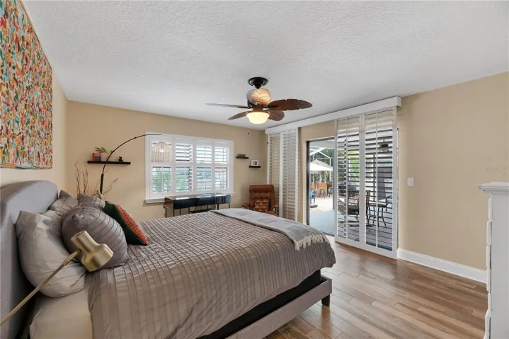 This secondary bedroom is located on the back of the home with private access to the lania.