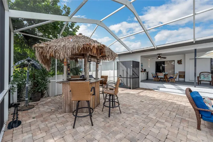 Next to the Tiki bar is the first of two outside showers.