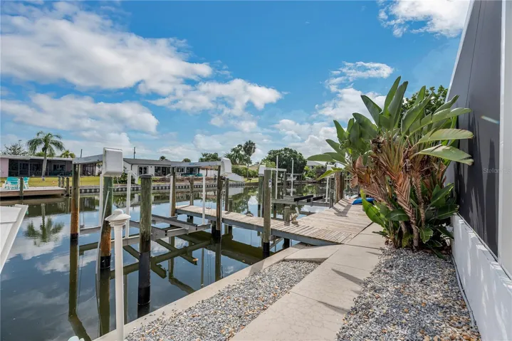 Boating enthusiasts will appreciate two private docks with 10,000- and 16,000-pound boat lifts, offering deep-water, bridge-free access to Tampa Bay.