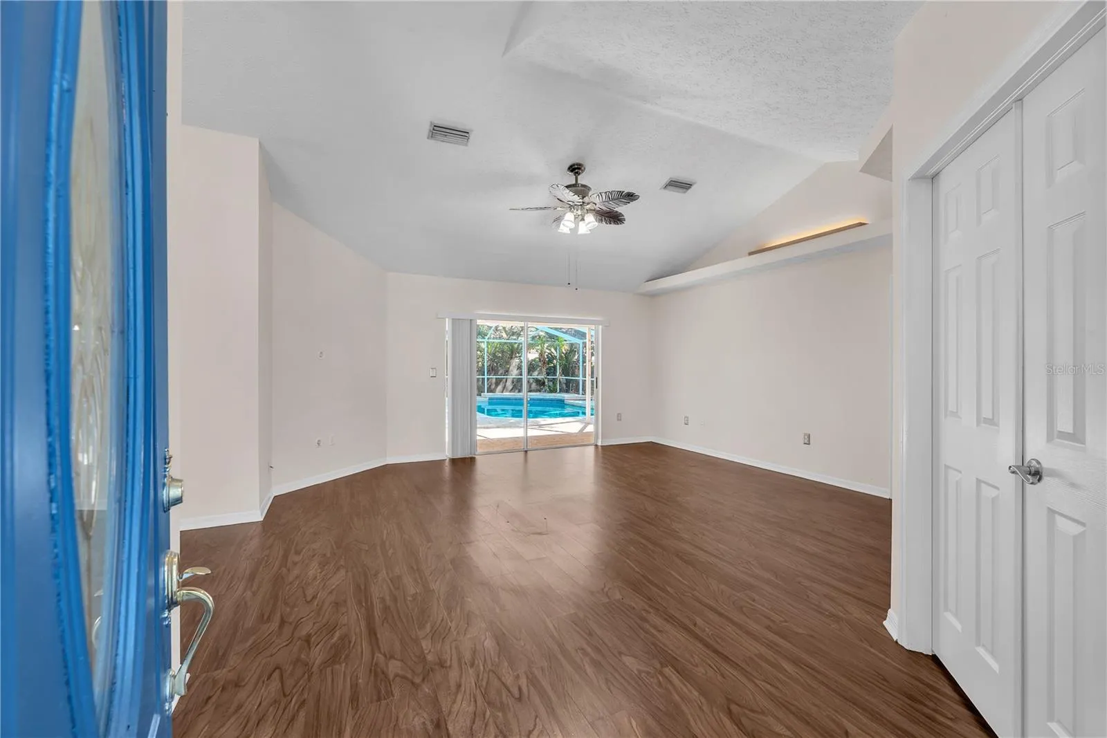 Step through the welcoming foyer and into the formal living and dining rooms with the double doors leading into a convenient office space or forth bedroom.