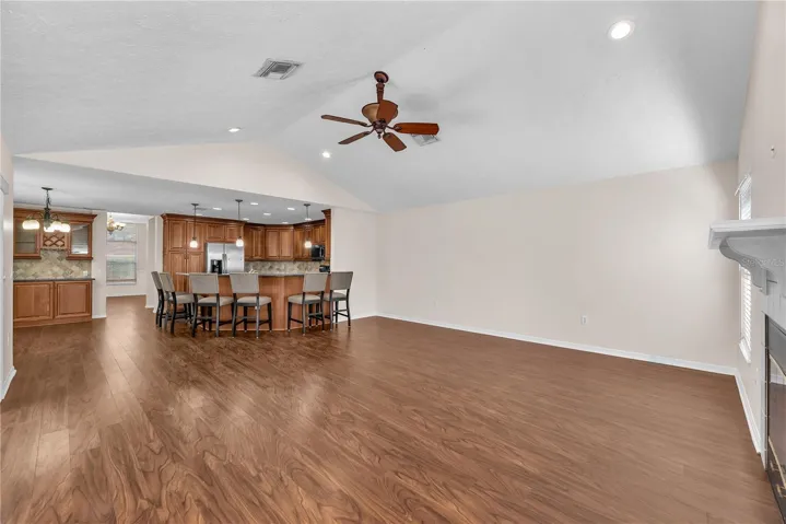 There is a seamless and easy connection between the family room and kitchen.