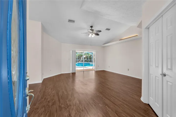 Step through the welcoming foyer and into the formal living and dining rooms with the double doors leading into a convenient office space or forth bedroom.