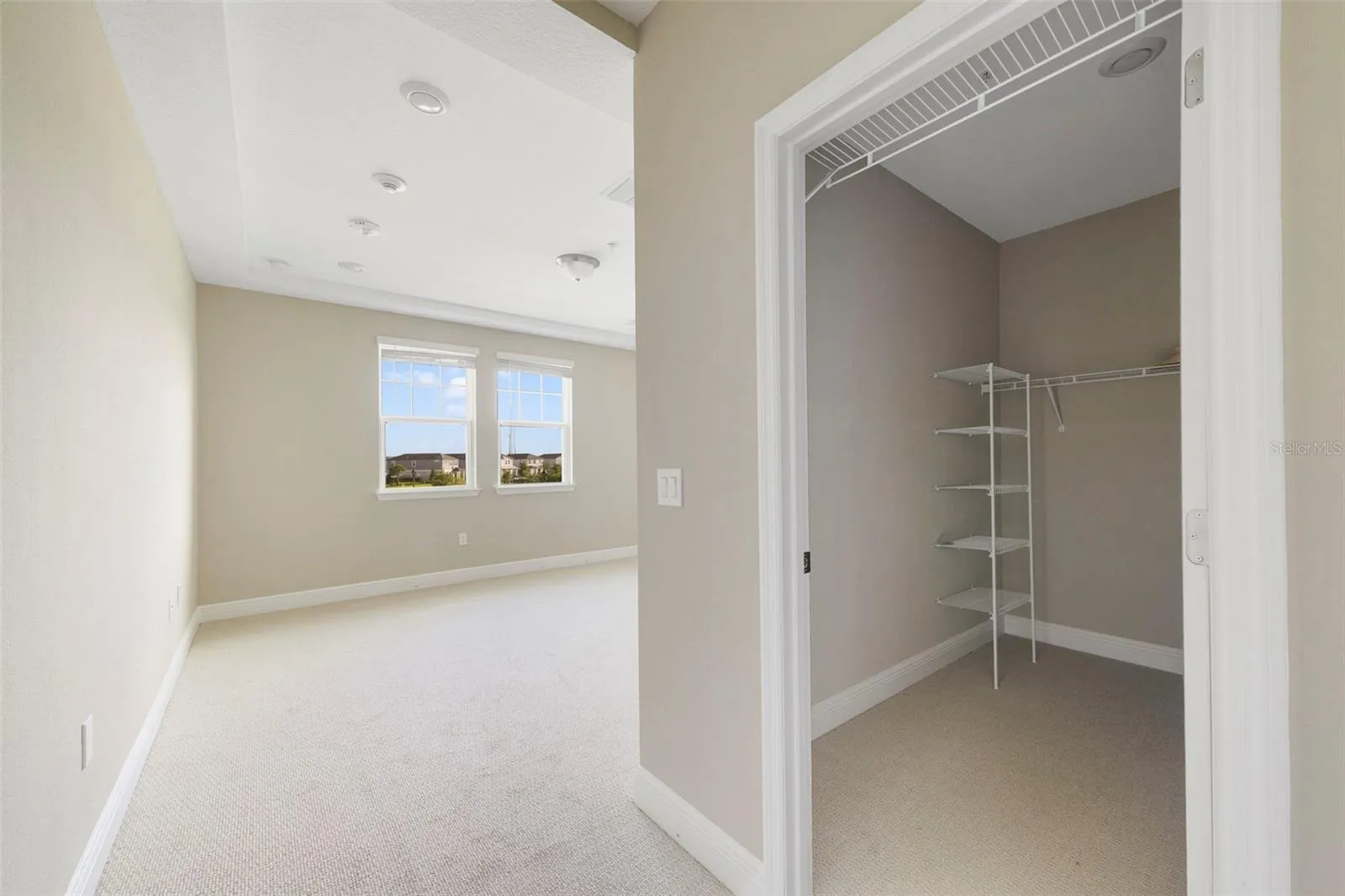 The Primary Suite walk-in closet.