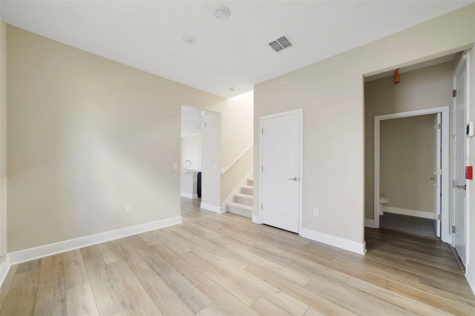 A versatile FLEX SPACE on the main floor provides even more living options and could easily serve as a HOME OFFICE, STUDY OR FORMAL LIVING ROOM.