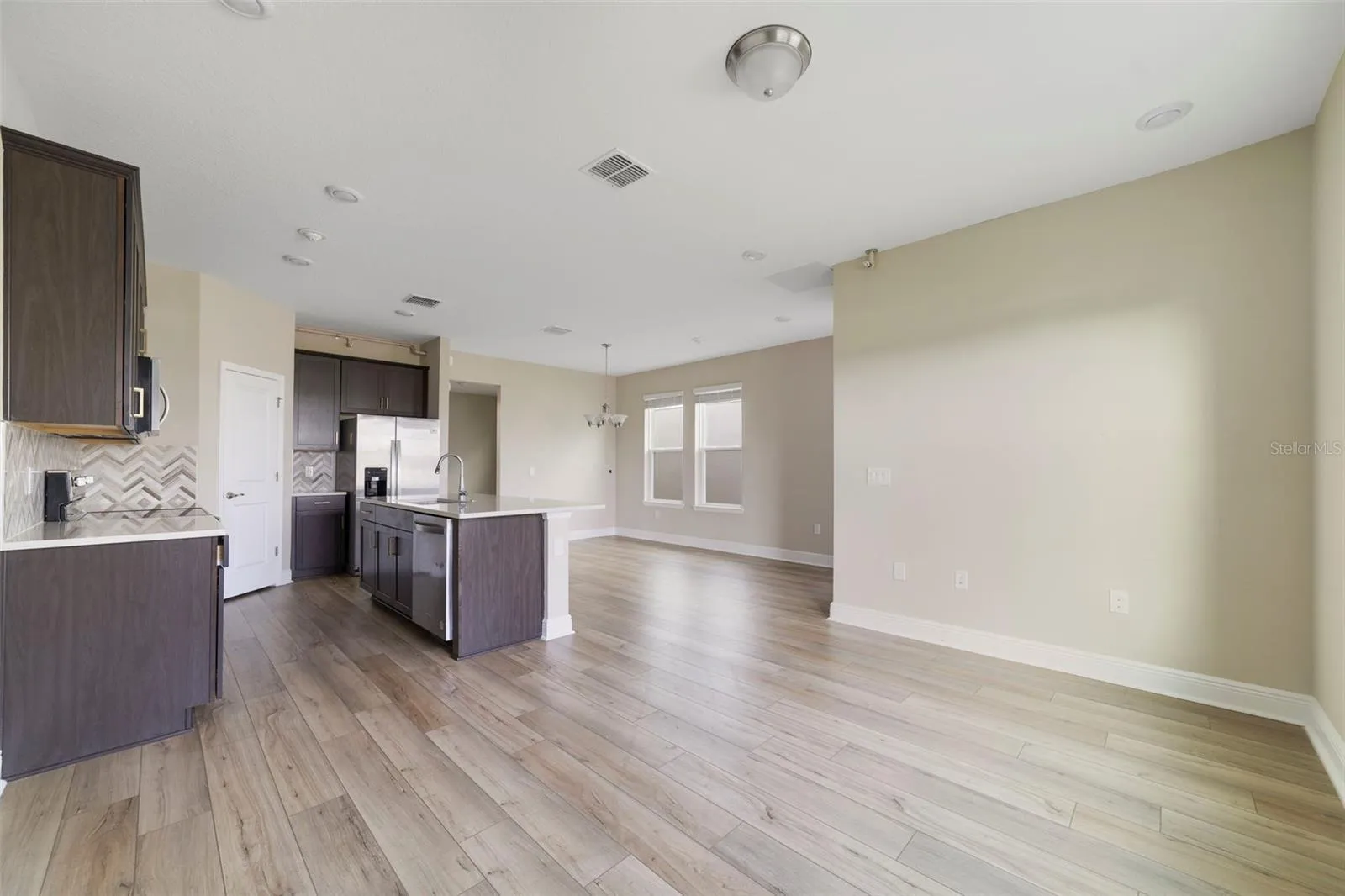 With the Kitchen opening directly to the Dining and Living areas, it's easy to stay connected whether you're preparing a meal, enjoying a casual breakfast or gathering with friends and family.