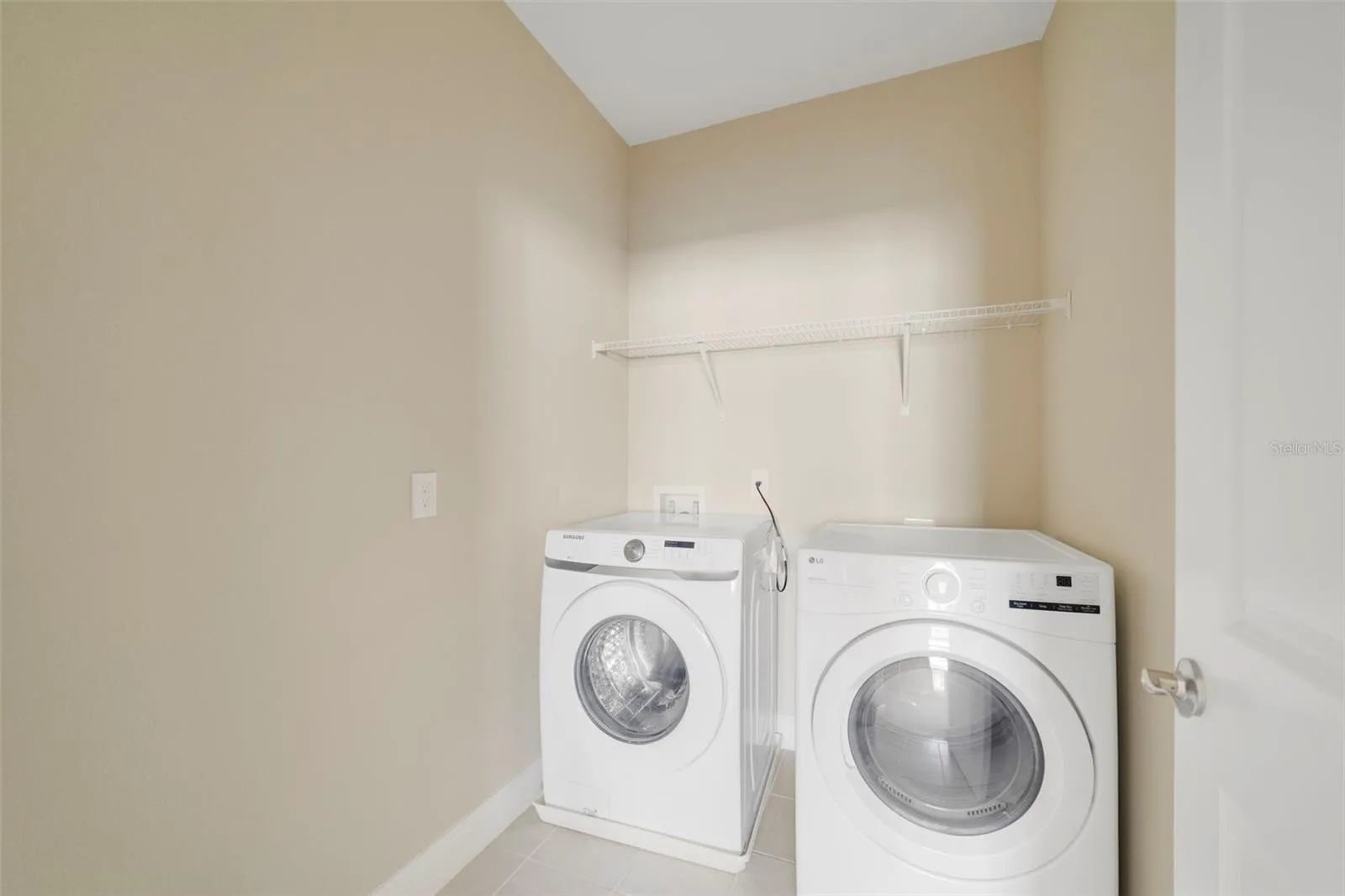 The UPSTAIRS LAUNDRY ROOM adds everyday convenience, with the WASHER AND DRYER INCLUDED.