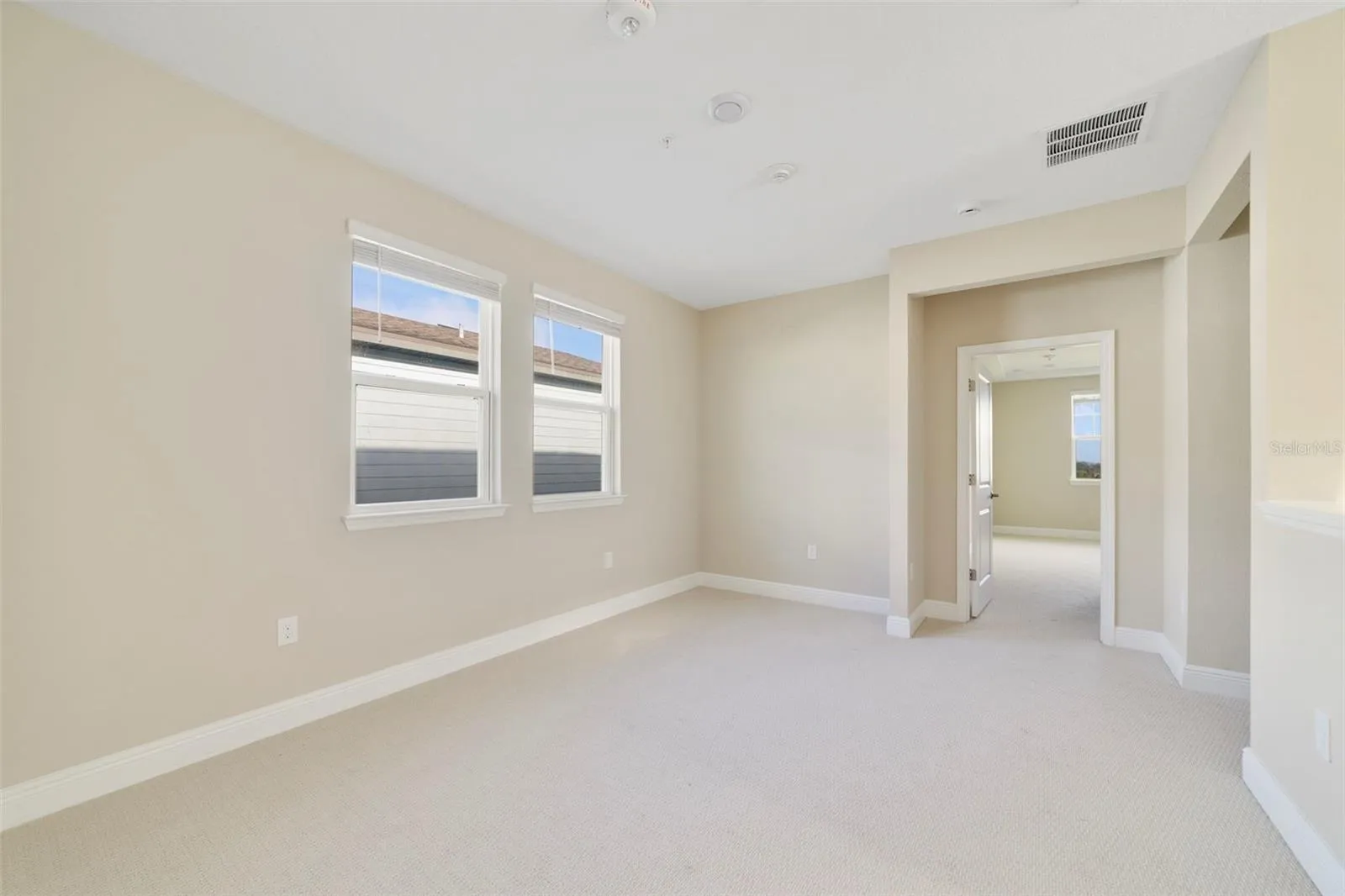 At the top of the stairs, the carpeted Loft creates an additional FLEXIBLE LIVING SPACE that could be used as a playroom, media area, homework zone or second gathering space.