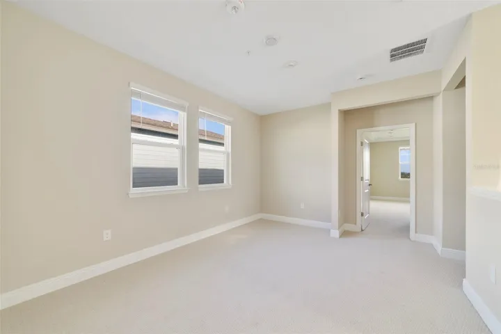 At the top of the stairs, the carpeted Loft creates an additional FLEXIBLE LIVING SPACE that could be used as a playroom, media area, homework zone or second gathering space.