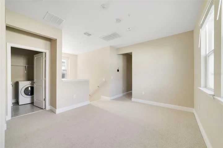 At the top of the stairs, the carpeted Loft creates an additional FLEXIBLE LIVING SPACE that could be used as a playroom, media area, homework zone or second gathering space.