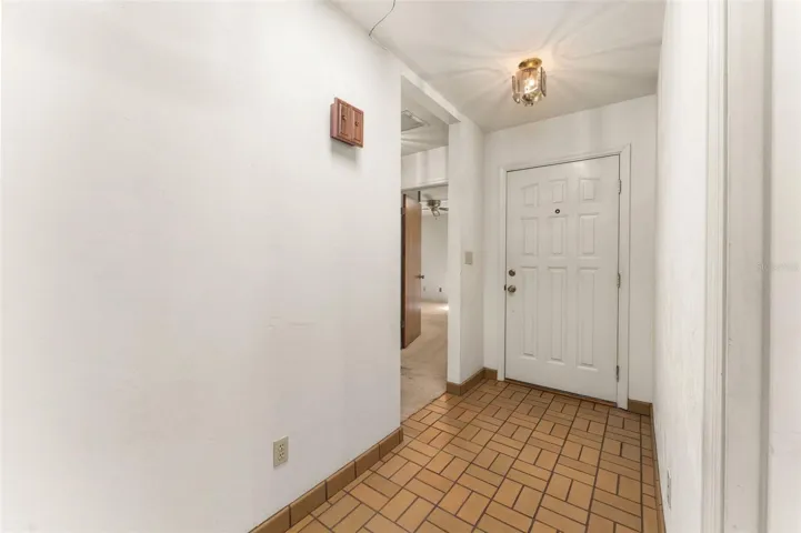 Front door hallway to bedrooms 2 and 3 as well as living room