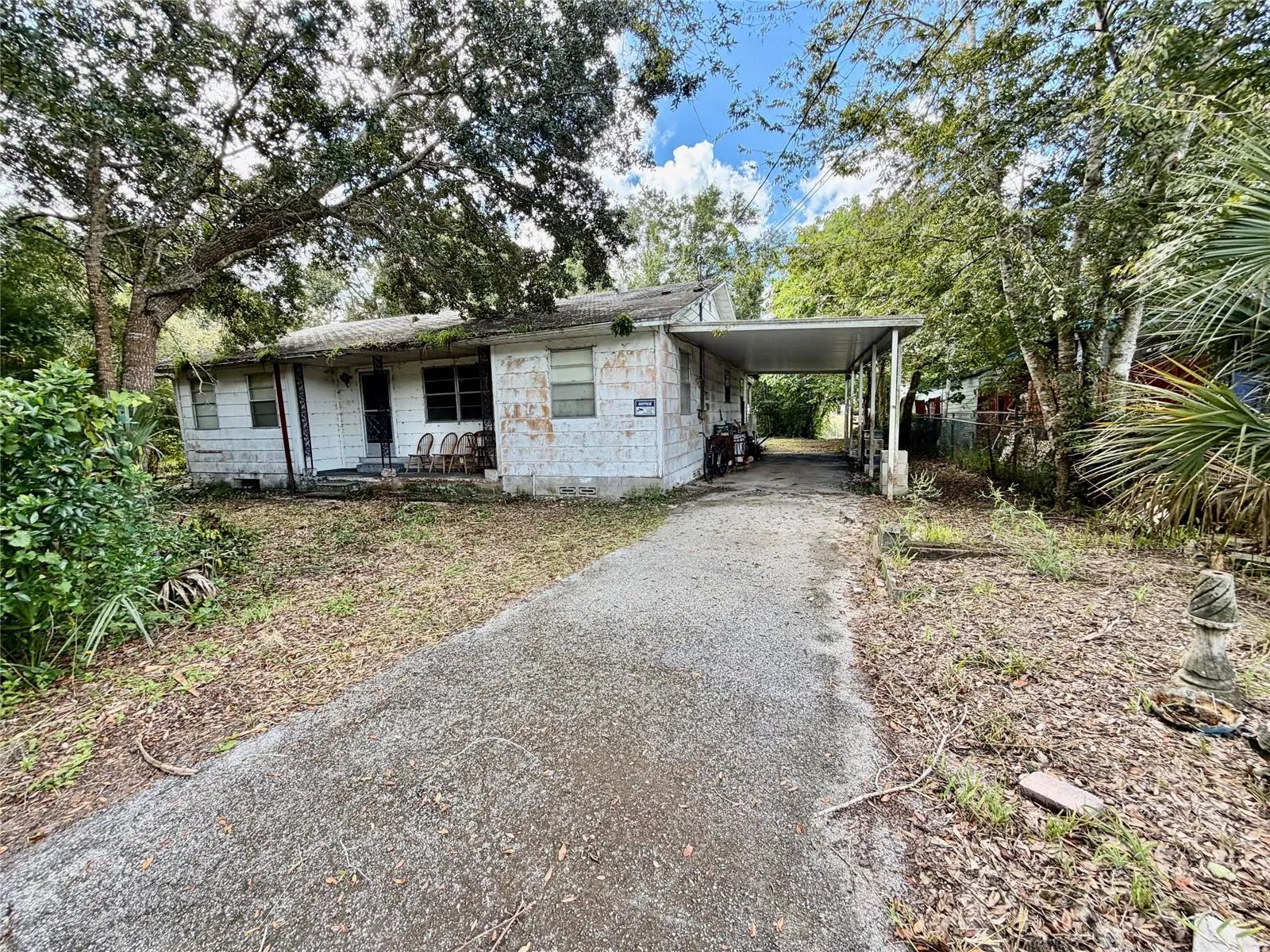 View of 6464 Arbutus Ave from inside gate
