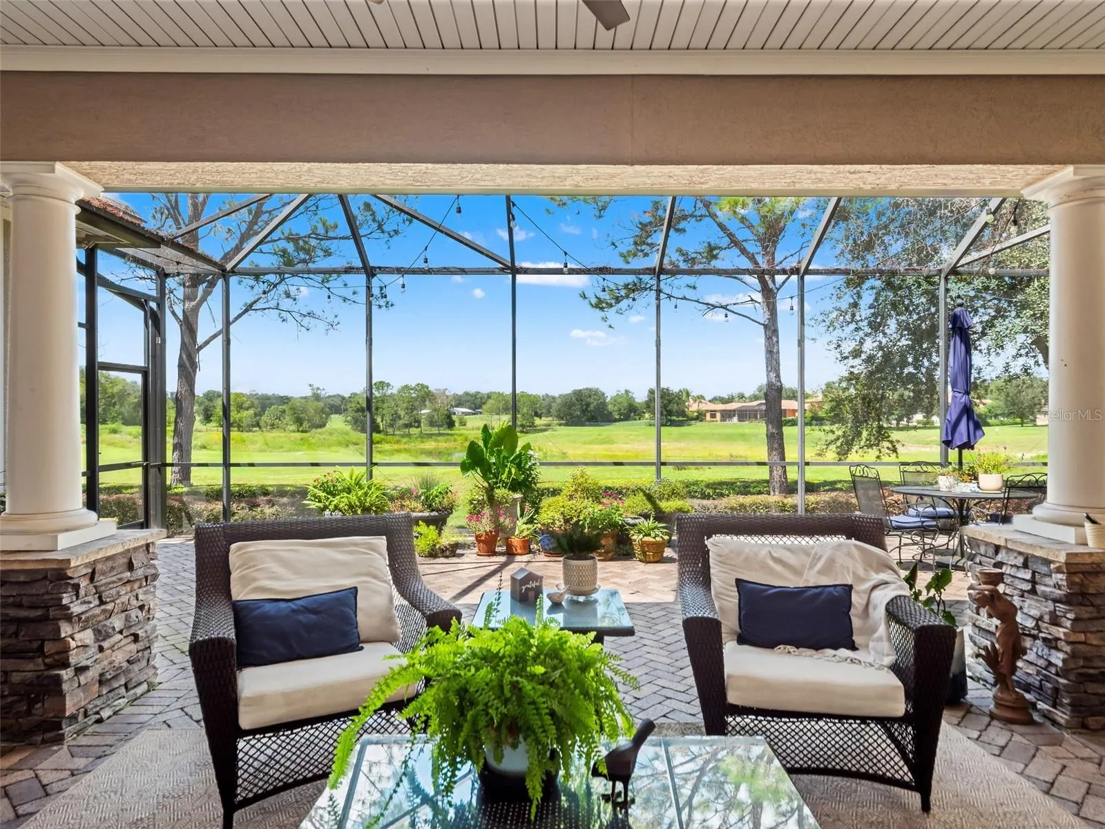 Amazing view from patio...golf course, pond, and horses in the distance