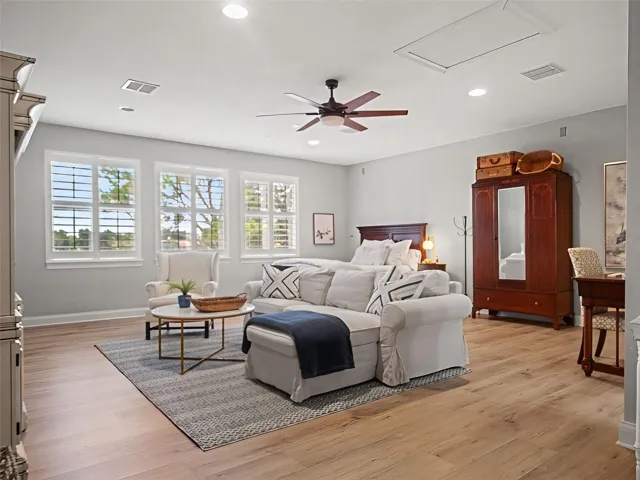 "Apartment" with bed, armoire, and tv/sitting area