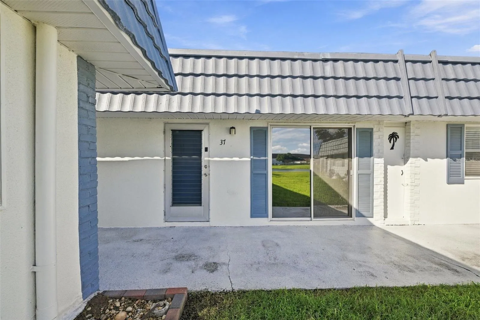 Home with sliding glass door to view water and wildlife