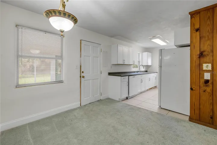 Front entry room looking AT kitchen area