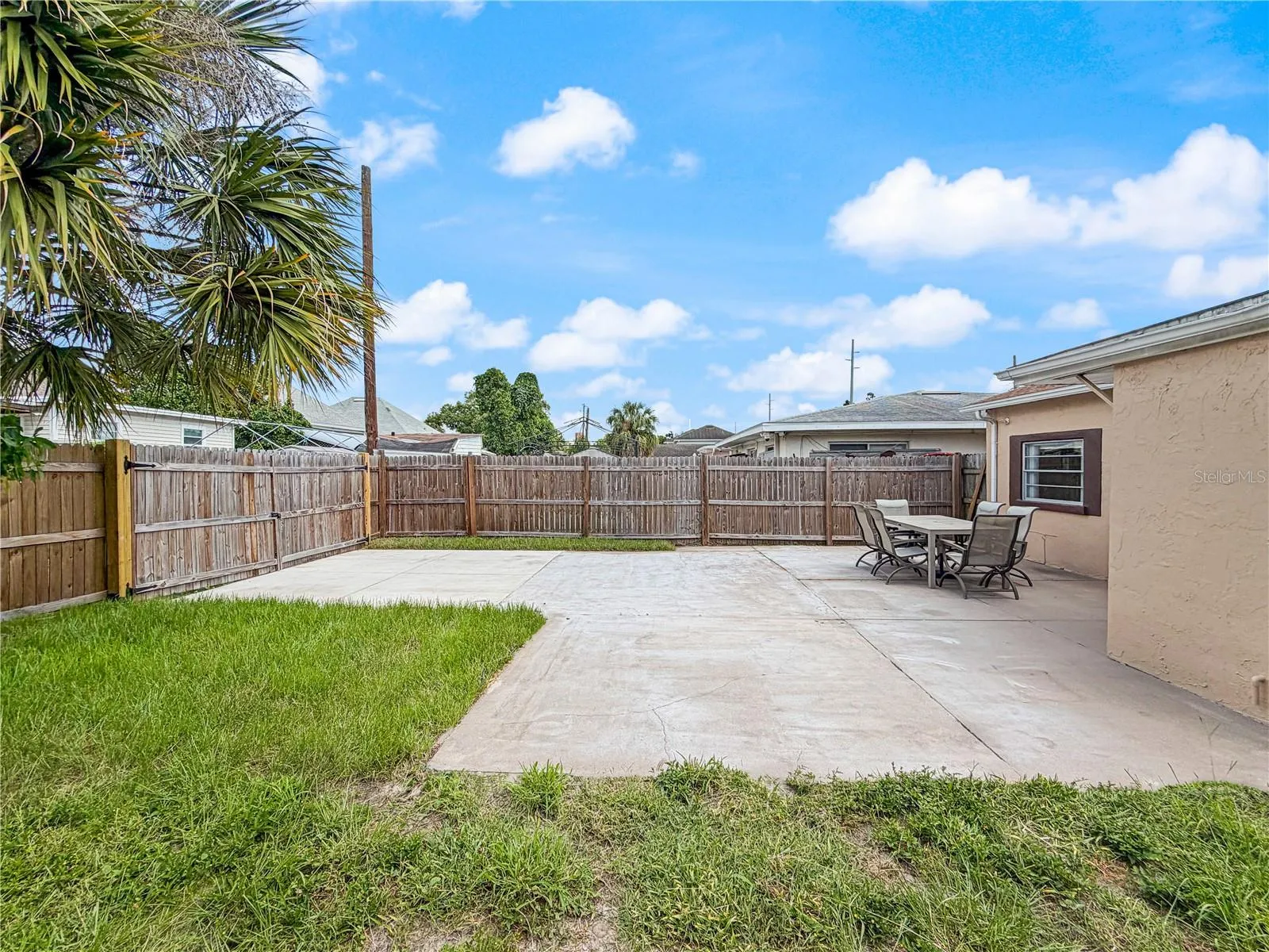 RV parking in the rear with a private gate and easement access, providing convenient access for an RV, boat, or other recreational vehicle.