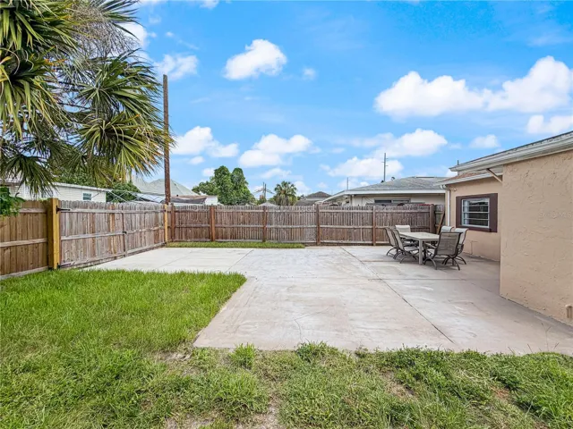 RV parking in the rear with a private gate and easement access, providing convenient access for an RV, boat, or other recreational vehicle.