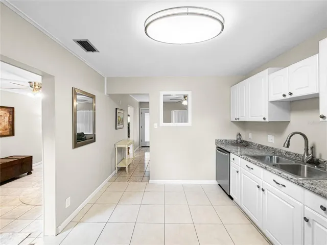 KITCHEN, TILE FLOORS, GRANITE COUNTERS, UPDATED KITCHEN CABINETS