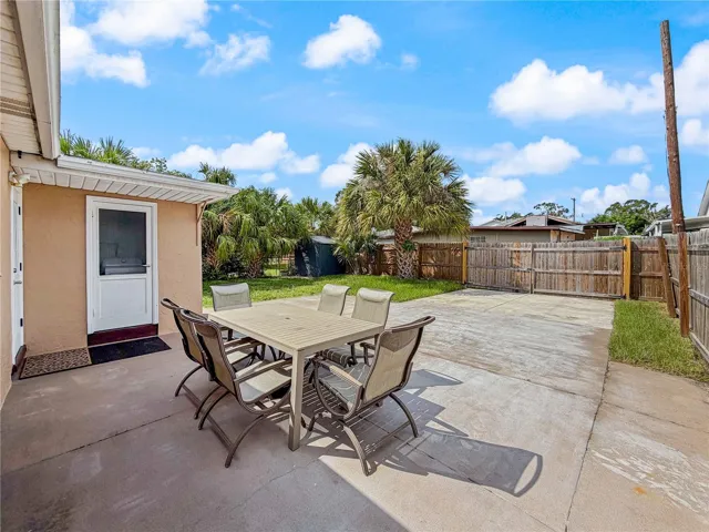 RV parking pad in the rear with a private gate and easement access, providing convenient access for an RV, boat, or other recreational vehicle.