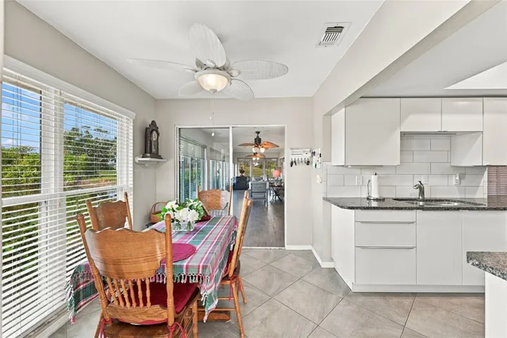 Beautiful and cozy eat-in kitchen is perfect for morning coffee and watching the wild life.