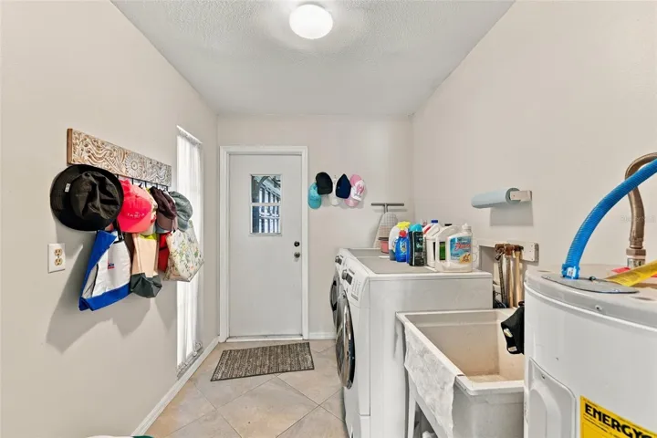 Laundry room is large with easy access to the garage.