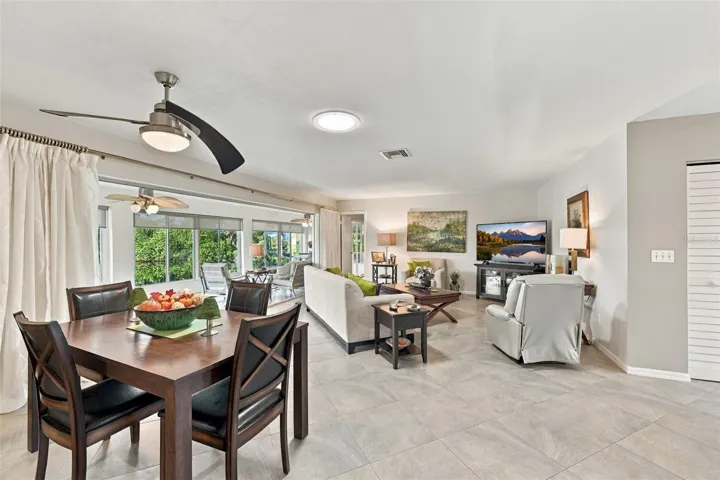 Beautiful tile flooring floats through out the open floor plan of the home, in a modern diagonal pattern. A large wall of windows brings in light, mother nature and a world of tranquility and peace.