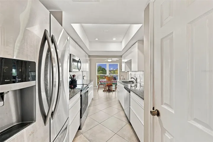 Kitchen offers lovely stainless steel appliances, lots of storage (including a pantry), granite counter tops and an exceptional view.