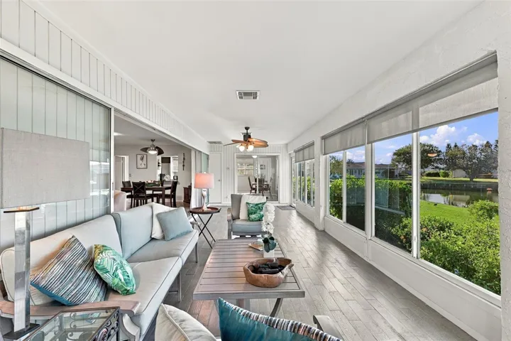 The perfect place to watch the world go by, read a book or just take a nap!  Notice how the sliding glass doors all go behind the wall for maximum opening space.