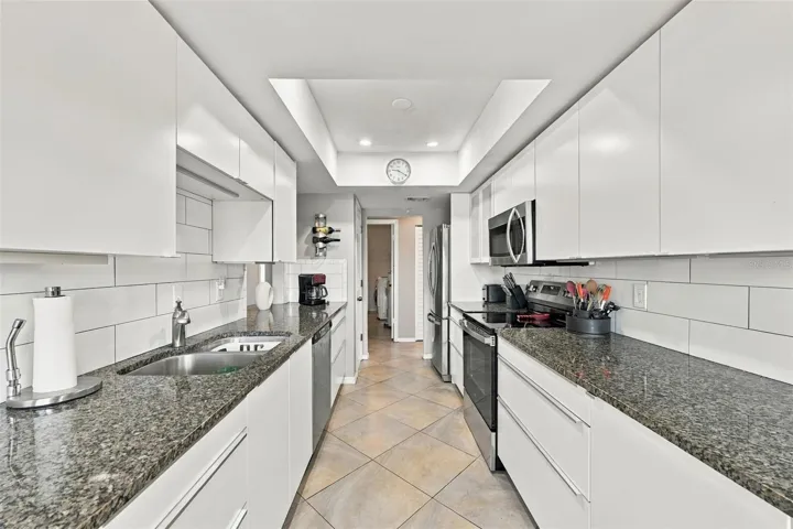 From the kitchen it is easy access to the laundry room and additional storage.