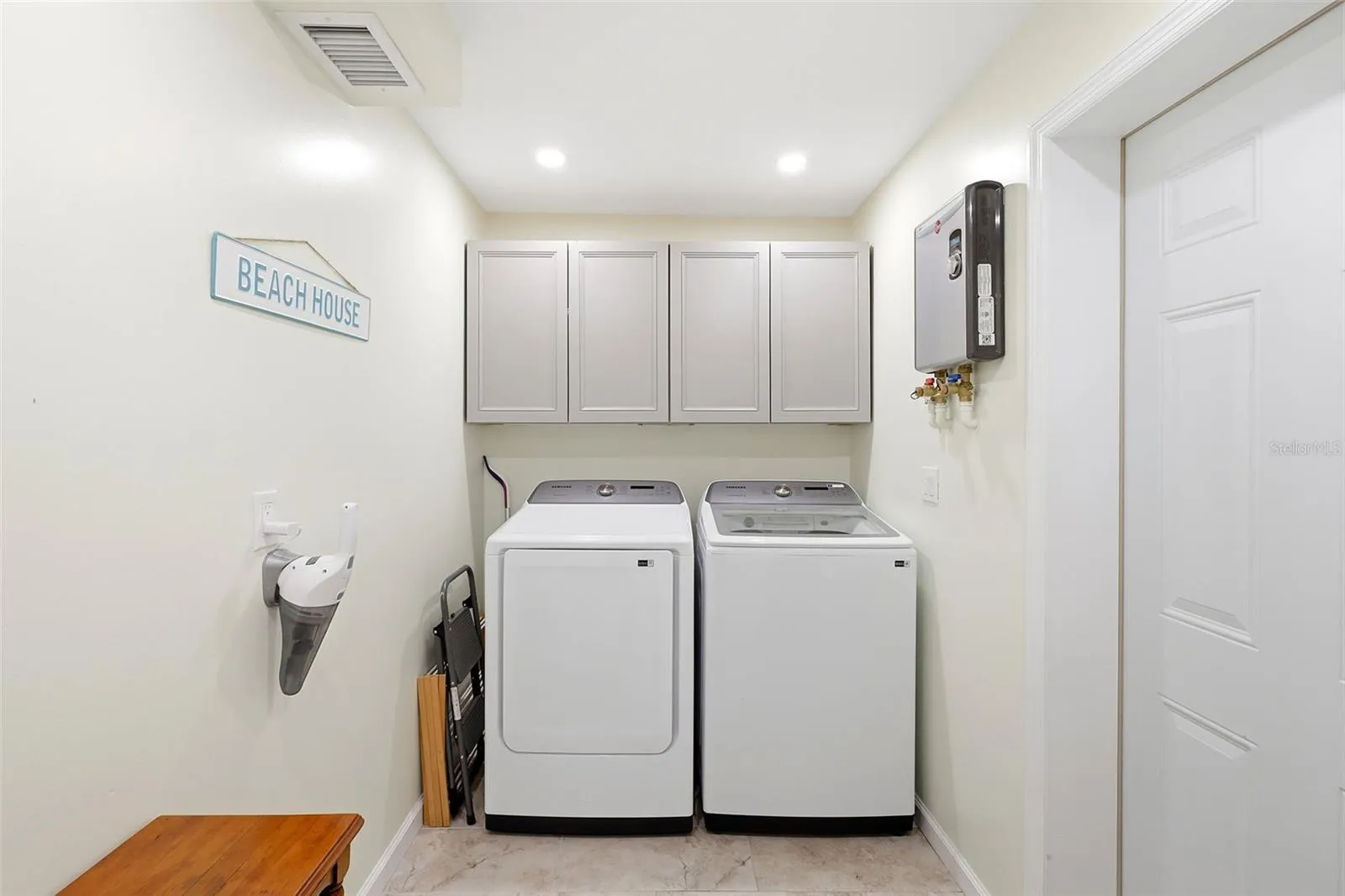 Laundry with tankless water heater