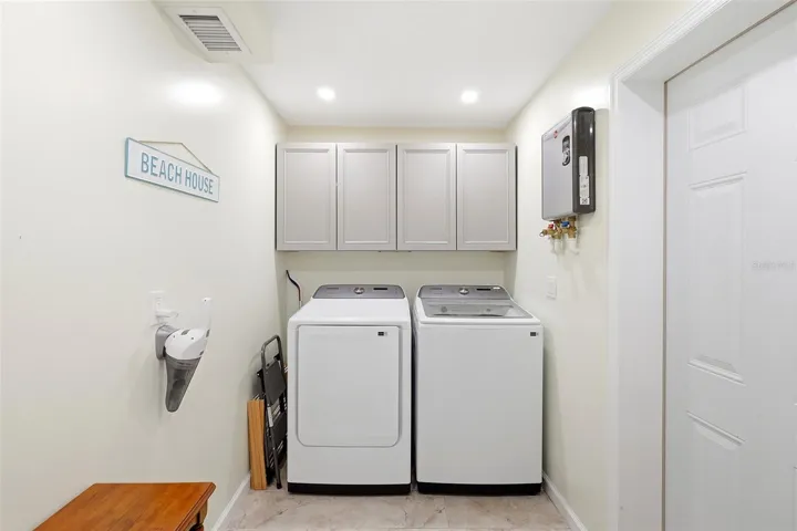 Laundry with tankless water heater