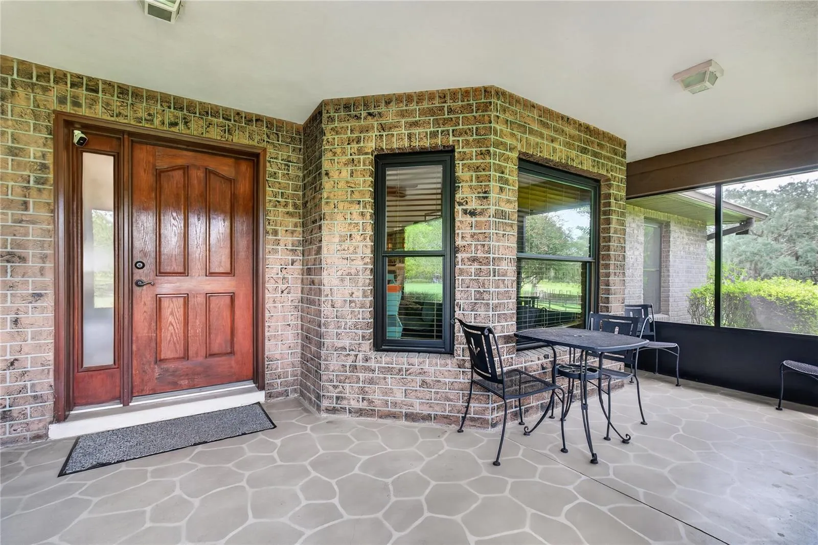 Front porch/screened, sitting area