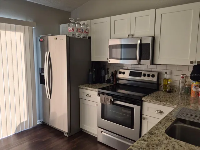 Kitchen sink and stone counters