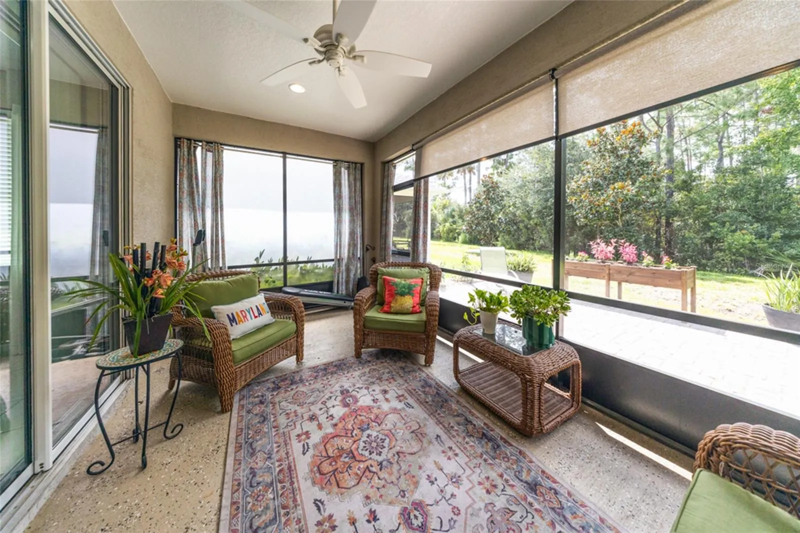 Screened in lanai with privacy shades