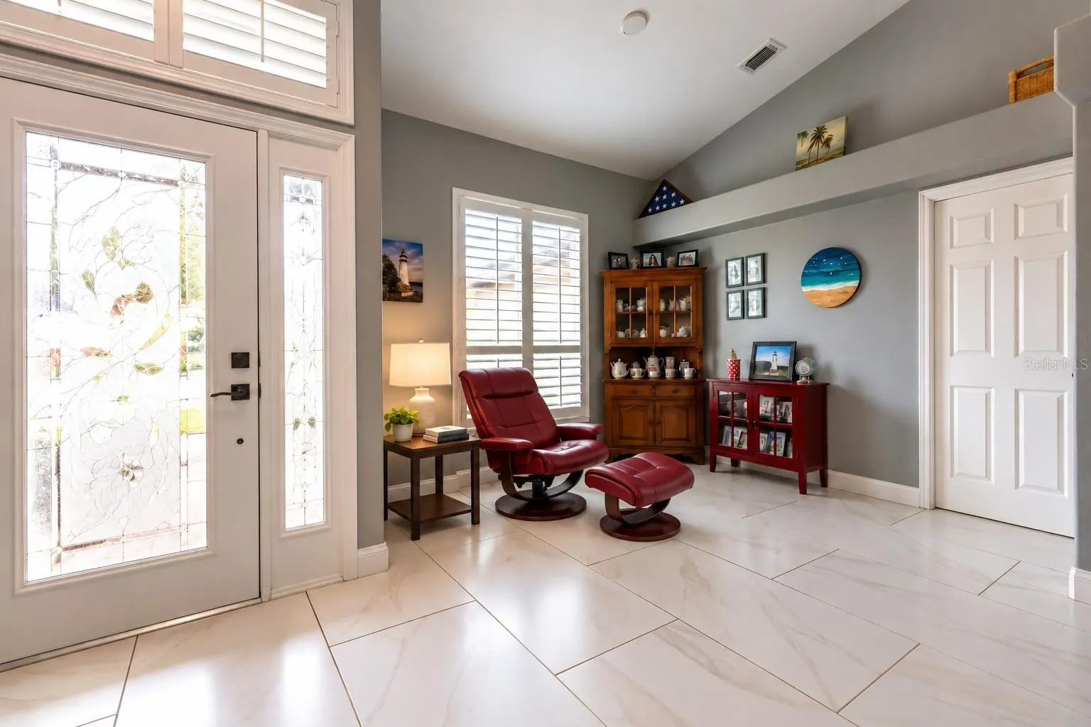 Front area perfect for reading or relaxing and the pocket door closes off the kitchen.