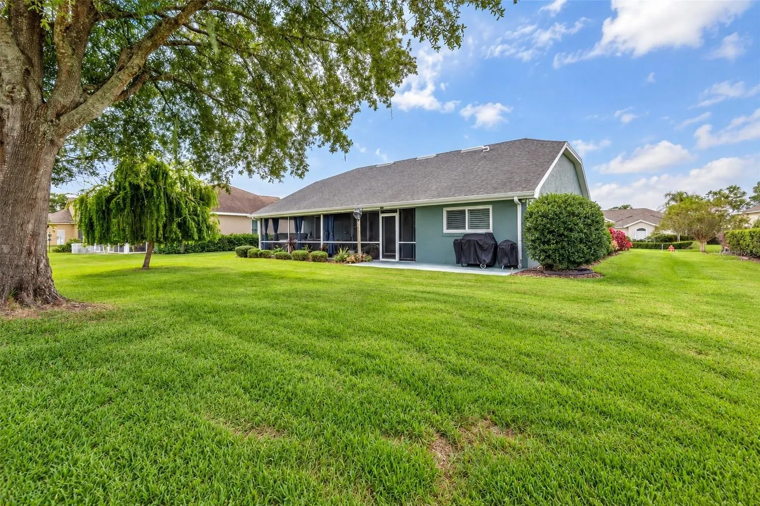 Back and side of home. Landscaping is including with the HOA.