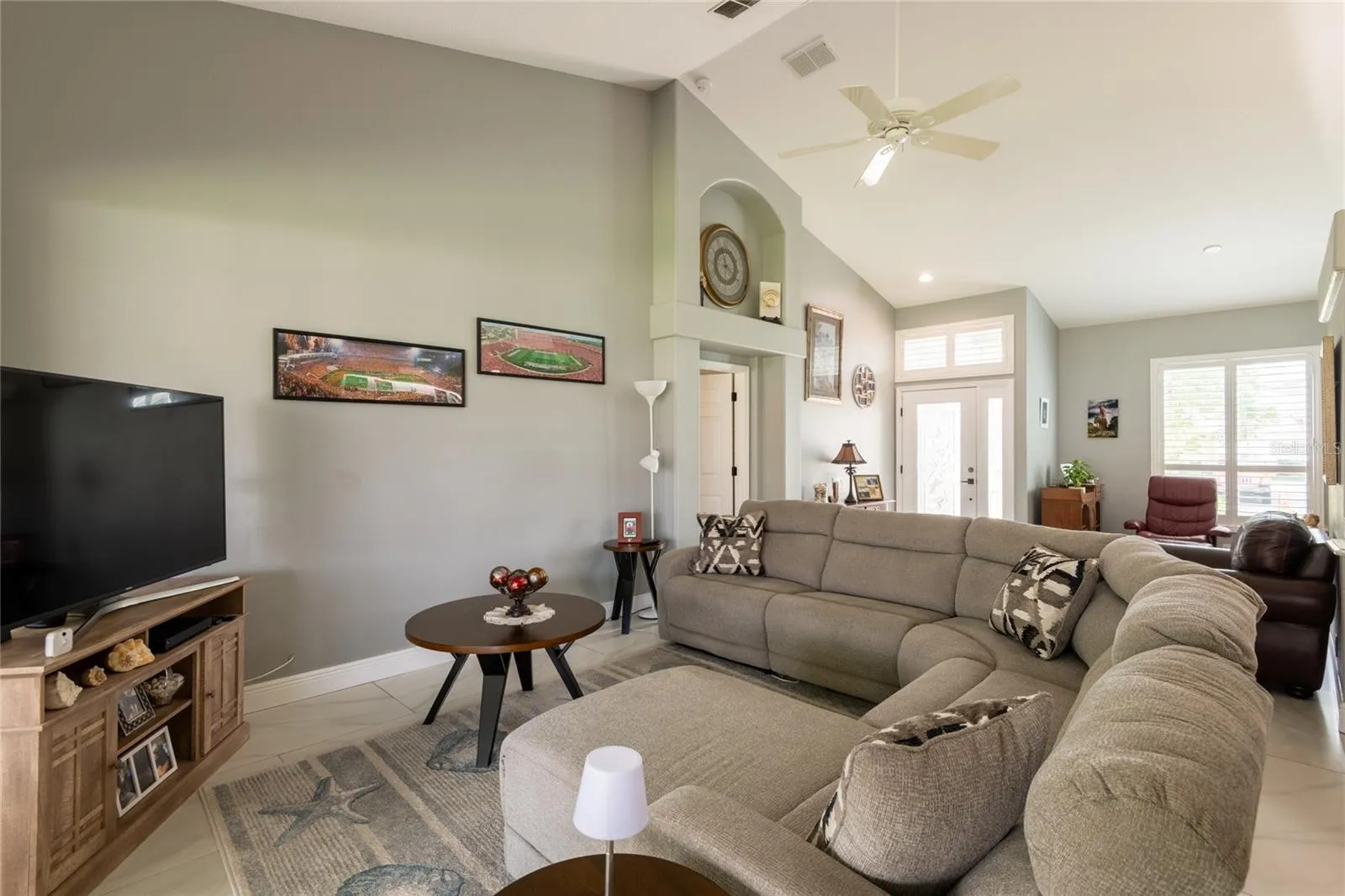 Large great room with vaulted ceilings.