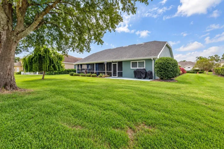 Back and side of home. Landscaping is including with the HOA.