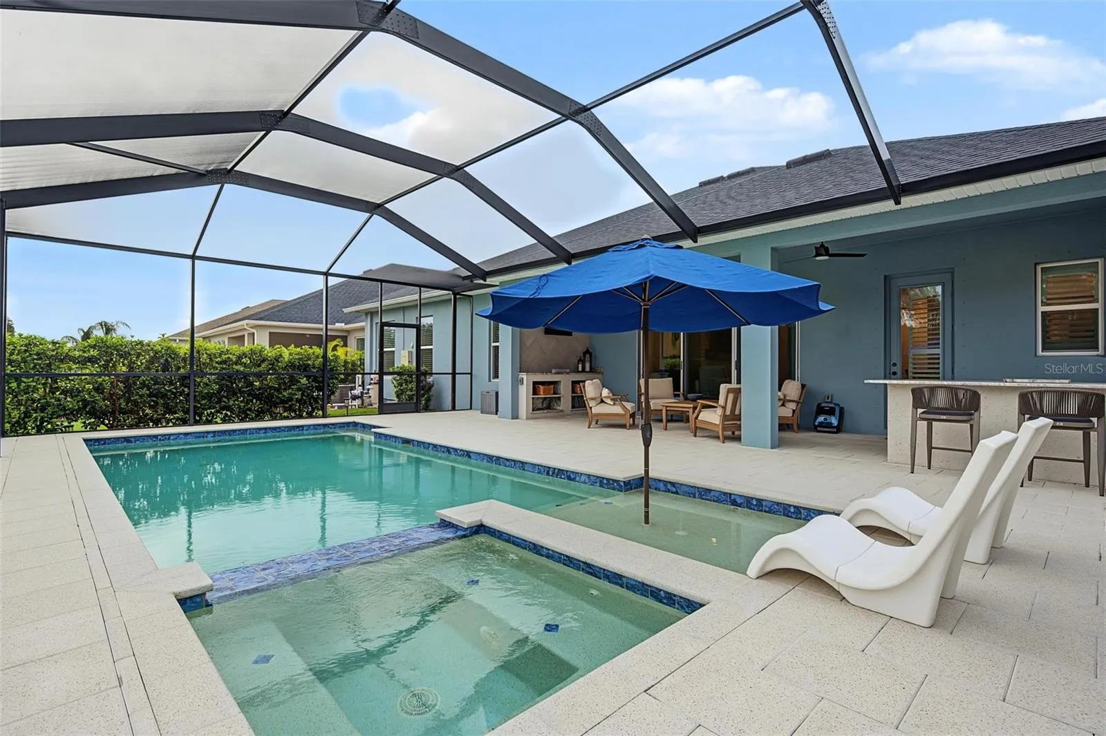 The party is at your house with the outdoor kitchen