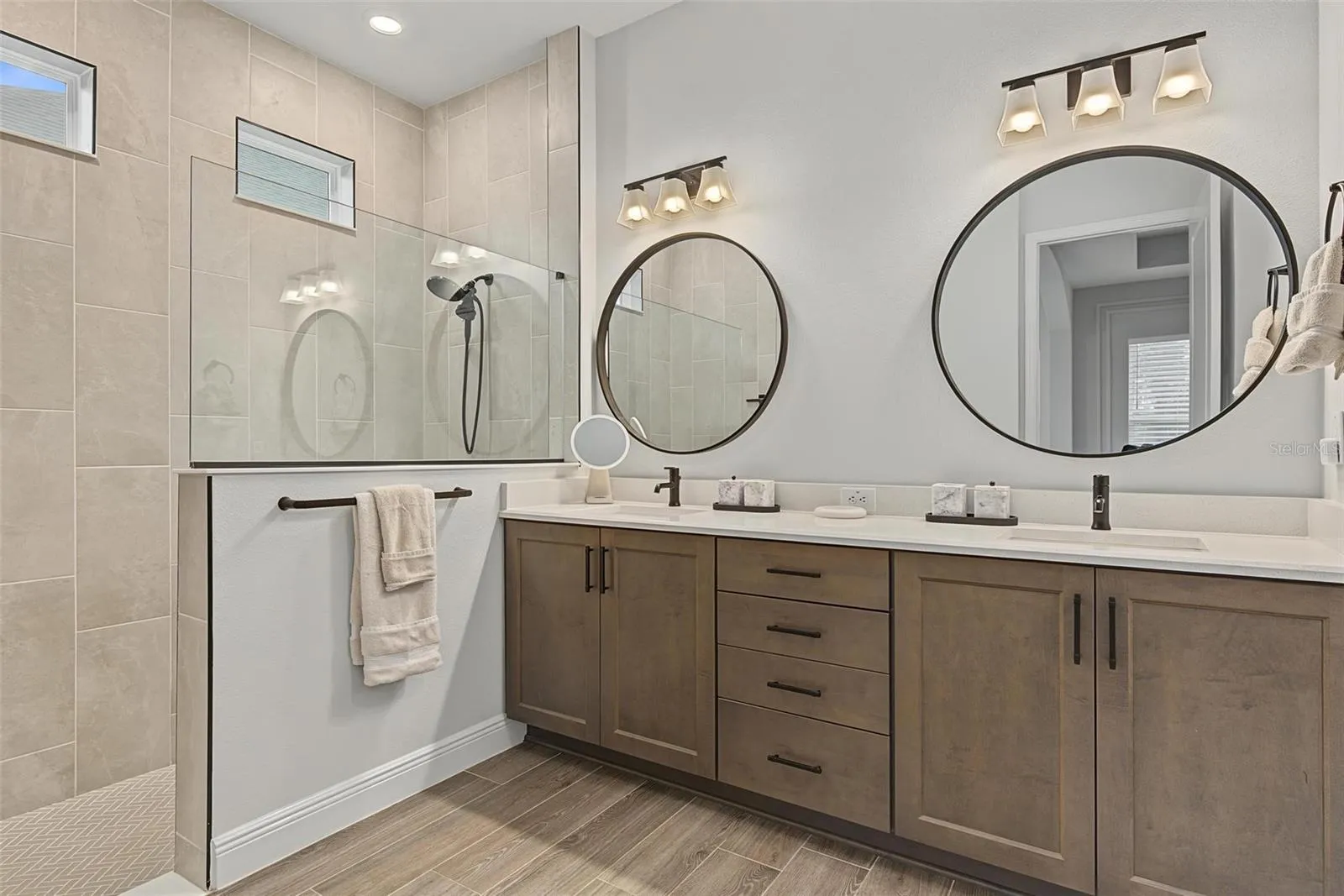 Primary bathroom with double vanity for additional storage options
